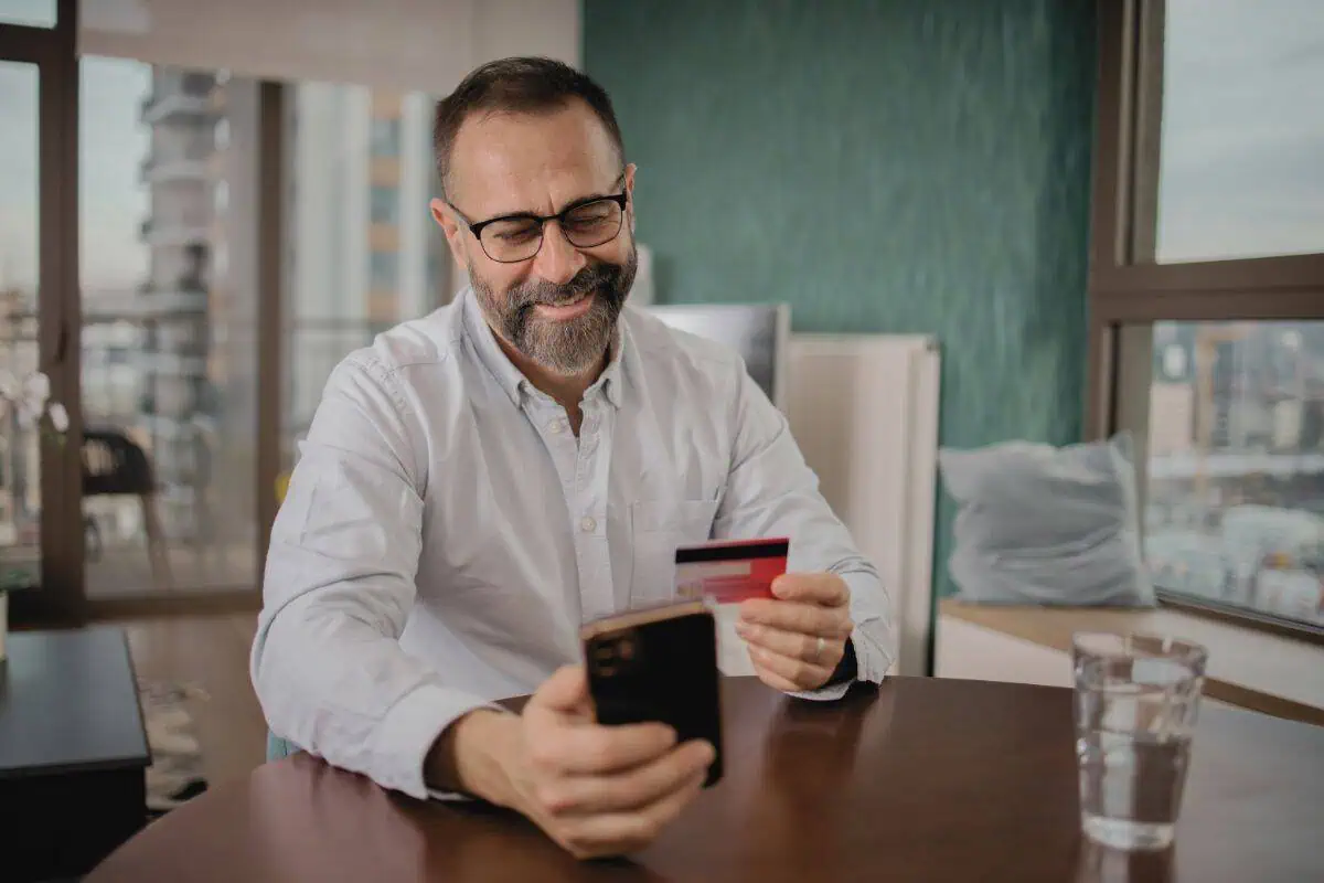 Happy customer enjoys shopping online